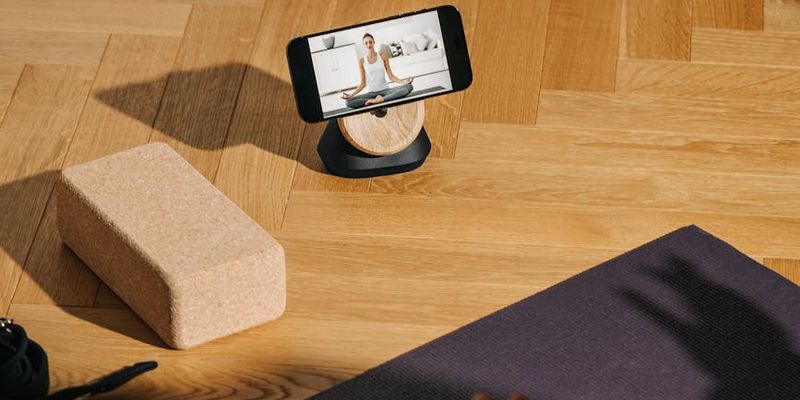 Minimalist fitness equipment on a dark reflective floor